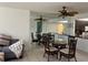 Charming dining area with glass table and wicker chairs at 23465 Harborview Rd # 1006, Punta Gorda, FL 33980