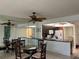 Kitchen with dark cabinets, granite counters and breakfast bar at 23465 Harborview Rd # 1006, Punta Gorda, FL 33980