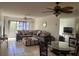 Open living and dining area with water view and ceiling fan at 23465 Harborview Rd # 1006, Punta Gorda, FL 33980