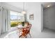 Breakfast nook with table and chairs near a window with a view at 24060 Buckingham Way, Punta Gorda, FL 33980