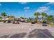 Parking lot with multiple golf carts at 24060 Buckingham Way, Punta Gorda, FL 33980