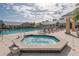 Octagonal hot tub near the community pool at 24060 Buckingham Way, Punta Gorda, FL 33980