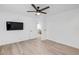 Bright bedroom featuring tile floors and a view into the dining area at 2418 Frantz St, North Port, FL 34286