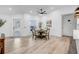 Casual dining area with a wood table and chairs near a window at 2418 Frantz St, North Port, FL 34286