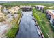 Aerial view of waterfront community with private boat docks at 25188 Marion Ave # 1011, Punta Gorda, FL 33950