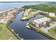 Aerial view of waterfront community and surrounding waterways at 25188 Marion Ave # 1011, Punta Gorda, FL 33950