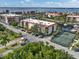 Aerial view of waterfront community with tennis court at 25188 Marion Ave # 1011, Punta Gorda, FL 33950