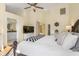 Bright bedroom with king bed, ensuite bathroom access, and plenty of natural light at 25188 Marion Ave # 1011, Punta Gorda, FL 33950