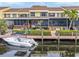 Private boat dock with a boat, steps from your back door at 25188 Marion Ave # 1011, Punta Gorda, FL 33950