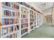 Community library with numerous bookshelves at 25188 Marion Ave # 1011, Punta Gorda, FL 33950