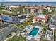 Community pool and tennis courts with waterfront views at 25188 Marion Ave # 1011, Punta Gorda, FL 33950