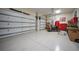 Garage with epoxy flooring and storage cabinets at 2521 Rio Grande Dr, Punta Gorda, FL 33950