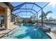 Large swimming pool and spa with screened enclosure and water views at 2521 Rio Grande Dr, Punta Gorda, FL 33950