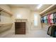 Large walk-in closet with ample shelving and hanging space at 2521 Rio Grande Dr, Punta Gorda, FL 33950