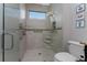 Large walk-in shower with grab bars and tiled walls at 2730 Rio Ct, Punta Gorda, FL 33950