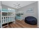 Bedroom with two bunk beds, a beanbag chair, and wood flooring at 2730 Rio Ct, Punta Gorda, FL 33950