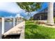 Steps lead from the backyard down to the private dock at 2730 Rio Ct, Punta Gorda, FL 33950