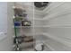 Walk-in pantry with ample shelving for storage at 2730 Rio Ct, Punta Gorda, FL 33950