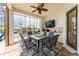 Outdoor kitchen and dining area overlooking the pool at 2730 Rio Ct, Punta Gorda, FL 33950