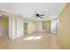 Spacious bedroom with ceiling fan and large closet at 282 Seminole Nw Blvd, Port Charlotte, FL 33952