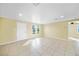 Bright and airy living room with tile floors at 282 Seminole Nw Blvd, Port Charlotte, FL 33952