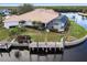 Aerial view showcasing waterfront property and private dock at 2856 Deborah Dr, Punta Gorda, FL 33950