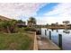 Private backyard oasis with canal access and lush landscaping at 2856 Deborah Dr, Punta Gorda, FL 33950