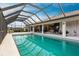 Inviting screened pool with canal views at 2856 Deborah Dr, Punta Gorda, FL 33950