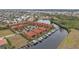 Aerial view of a luxury waterfront community, showcasing its private docks and location at 3500 Mondovi Ct # 212, Punta Gorda, FL 33950