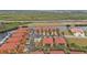 Aerial view of waterfront community with red tile roofs and private boat docks at 3500 Mondovi Ct # 212, Punta Gorda, FL 33950