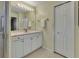 Bathroom with vanity, shower, and linen storage at 3500 Mondovi Ct # 212, Punta Gorda, FL 33950