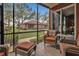 Relaxing screened patio with wicker furniture at 3500 Mondovi Ct # 212, Punta Gorda, FL 33950