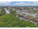 Aerial view of waterfront home and canal at 4118 Gardner Dr, Port Charlotte, FL 33952