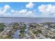 Aerial view of waterfront homes and calm waters at 4118 Gardner Dr, Port Charlotte, FL 33952