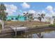 Private dock with seating area, perfect for relaxing by the water at 4118 Gardner Dr, Port Charlotte, FL 33952