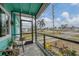 Relaxing screened porch overlooking a quiet residential street at 4118 Gardner Dr, Port Charlotte, FL 33952