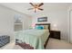 Bright bedroom with a double bed and ample storage at 4465 Kaskin Ave, North Port, FL 34286