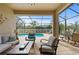 Relaxing screened-in patio with pool, seating area, and outdoor dining space at 4465 Kaskin Ave, North Port, FL 34286