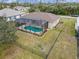 Aerial view showing home and private pool at 4557 Sabrina Ter, North Port, FL 34286