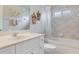 Bathroom with a bathtub, shower, and white vanity at 4557 Sabrina Ter, North Port, FL 34286