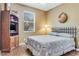 Bedroom with a full-size bed and built-in shelving at 4557 Sabrina Ter, North Port, FL 34286