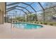 Screened pool and patio area, perfect for outdoor relaxation at 4557 Sabrina Ter, North Port, FL 34286