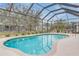 Inviting screened pool with a spacious deck at 4557 Sabrina Ter, North Port, FL 34286