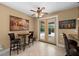 Bright breakfast nook with French doors leading to the pool area at 5208 Griggs Ave, North Port, FL 34291