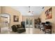 Relaxing Gathering room featuring a comfortable couch and workspace at 5208 Griggs Ave, North Port, FL 34291