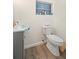 Small bathroom with toilet and vanity at 5298 Palena Blvd, North Port, FL 34287