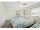 Bedroom with a ceiling fan and full bed at 5298 Palena Blvd, North Port, FL 34287