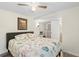 Bright bedroom with a comfortable bed and coastal-themed bedding at 5298 Palena Blvd, North Port, FL 34287