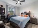 Stylish bedroom with a basketball theme and a comfortable bed at 5870 Hornbuckle Blvd, North Port, FL 34291