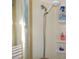 Clean shower with handheld shower head and storage at 6815 Amoko Ct, North Port, FL 34287